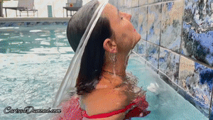 carissadumond.com - Carissa posing in the water feature&mdash;a tribute to wet hair fans! thumbnail